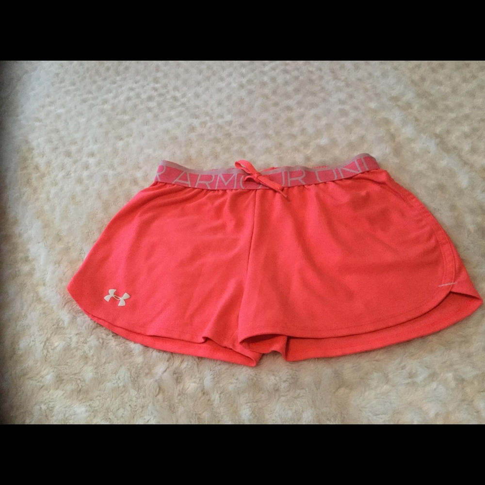Under Armour running shorts.